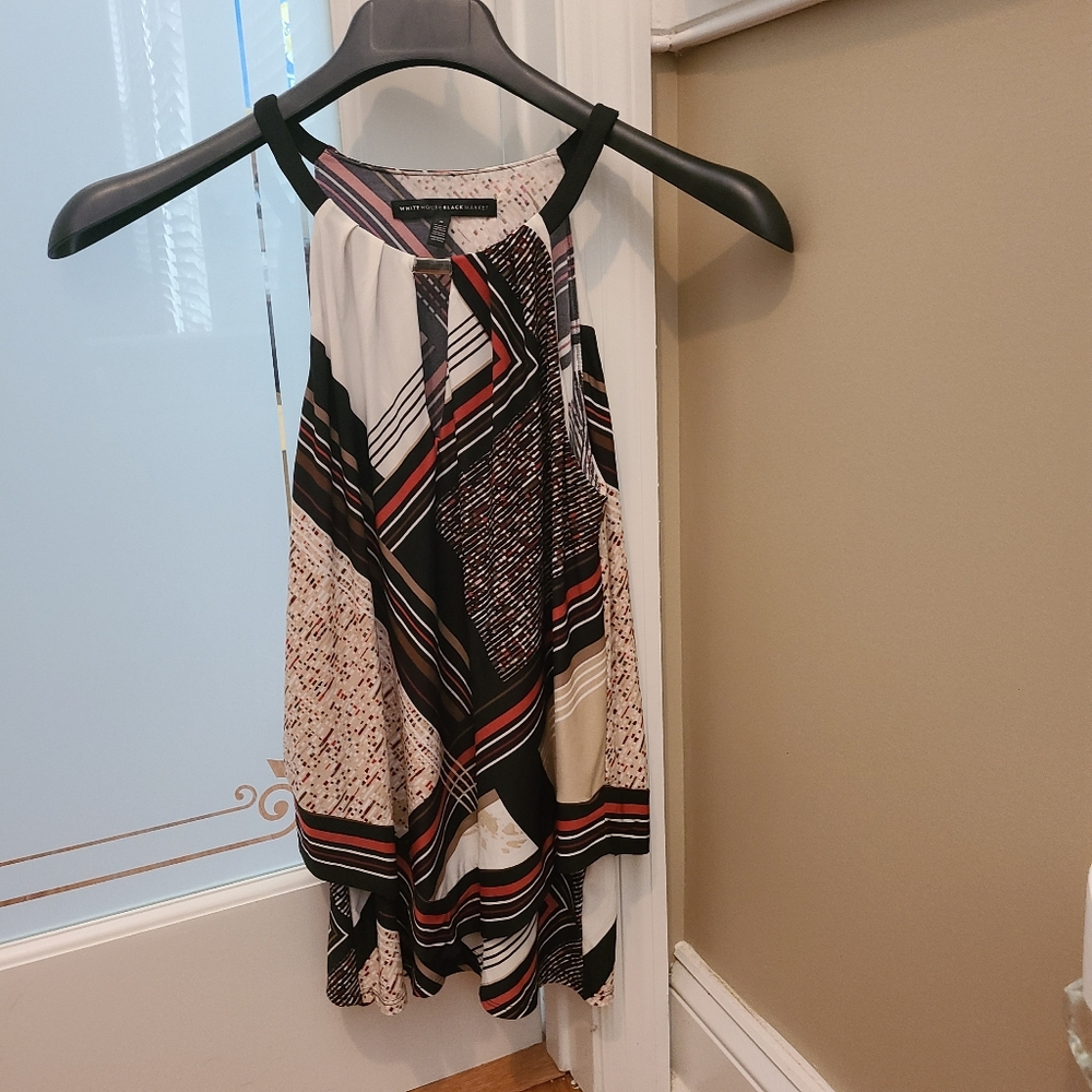 White house Black Market Sleeveless Top.  White , black, red. Size small.